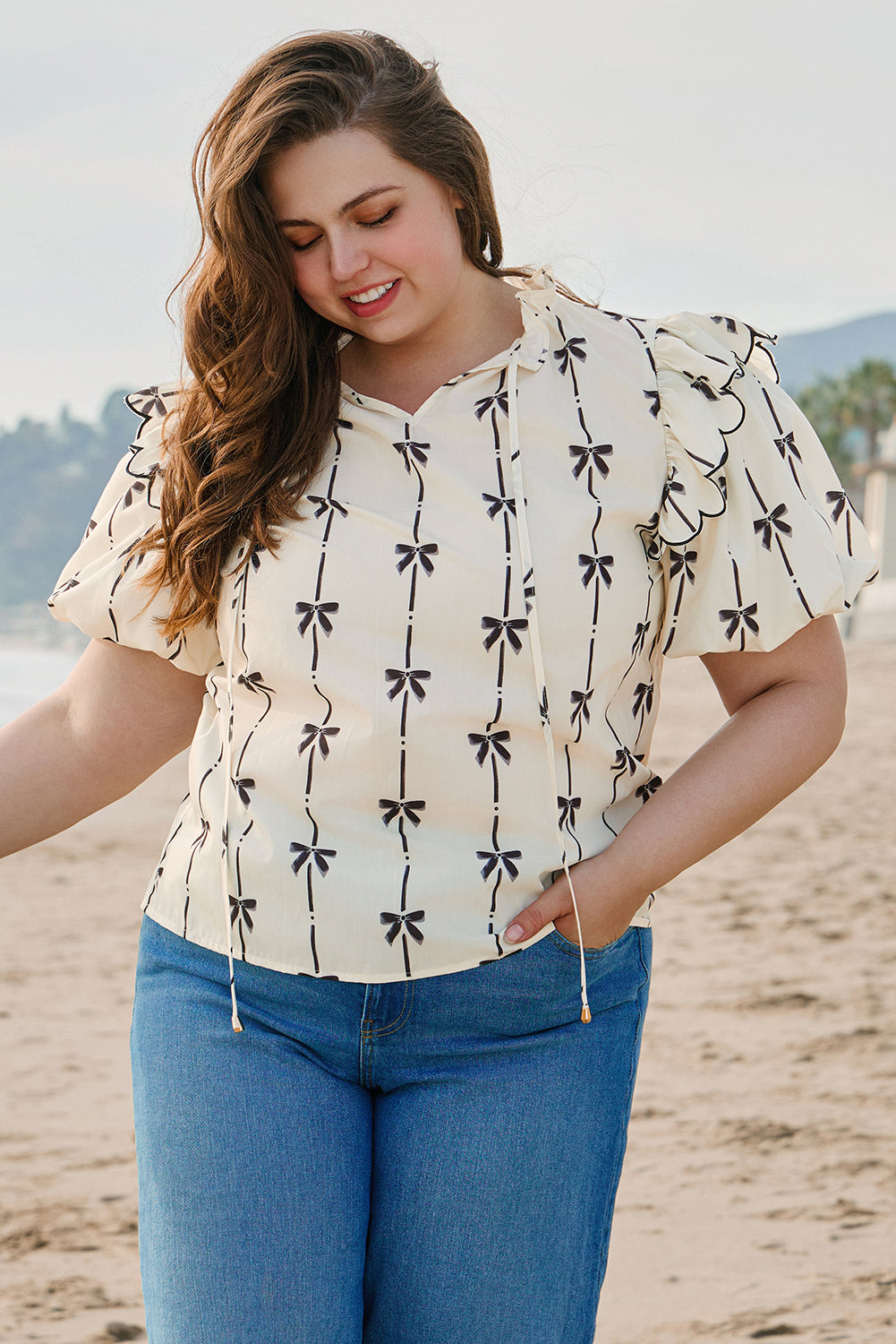 Apricot Bow Printed Ruffled Bubble Sleeve Lace-up Notched Neck Blouse